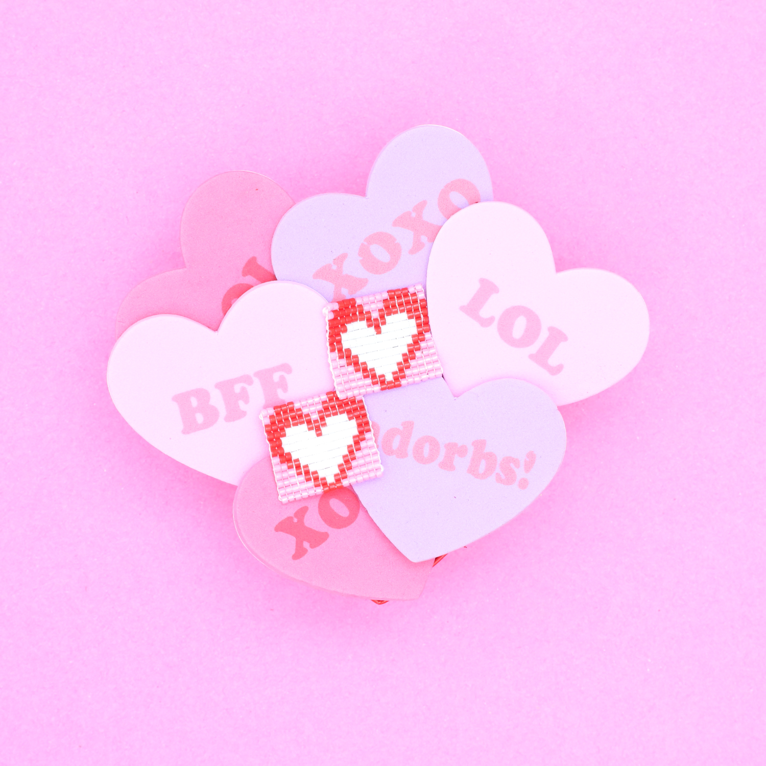 Valentine's Day Beaded Earrings Pattern for the loom by @sprinklesofzeal #makingbeadedearrings #Beadedheartearringstutorial #beadedjewelryideas #makeitwithzeal #earringsforvalentinesday